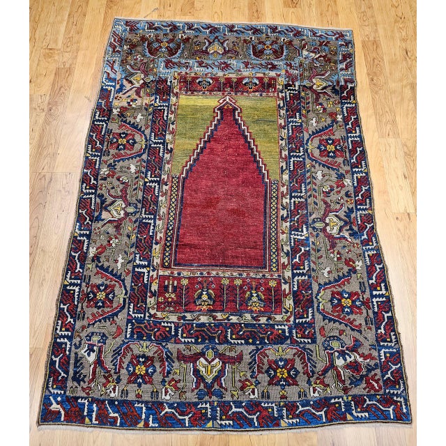 This exquisite 19th century Anatolian Konya Ladik rug features a distinguished prayer design of rare refinement, most...
