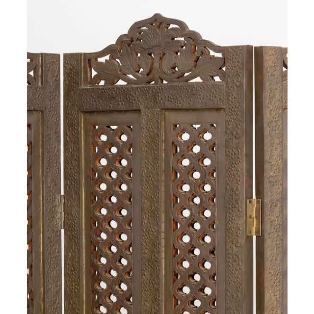 Syrian Palm Tree Motif Four Panel Brass Clad Screen, with pierced foliate crests and lattice panels. Each panel: 72.25" H...
