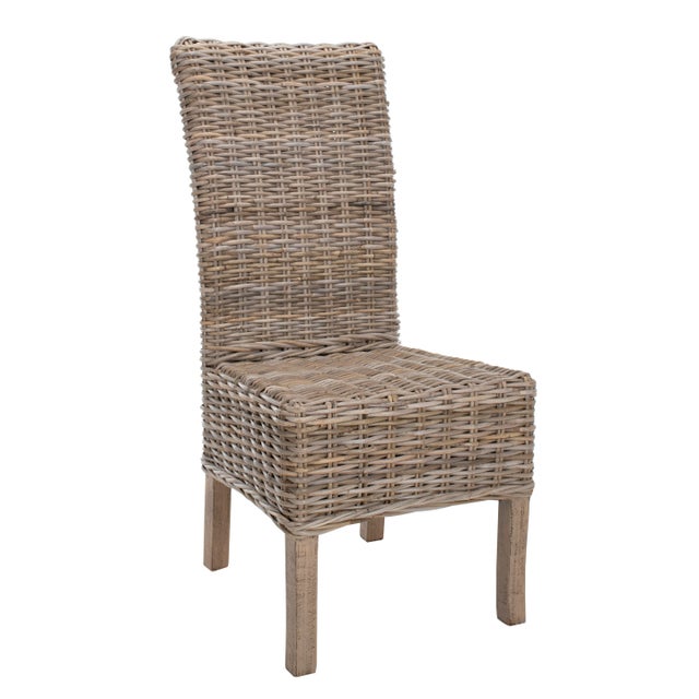 With a slightly tapered backrest and lovely unfinished rattan, the side chair is anything but staid. The fusion of classic...