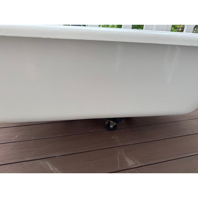 Beautiful and perfectly functional roll-top clawfoot bathtub. 60" long. 30" wide. Standard (approx. 17") depth. Note the...