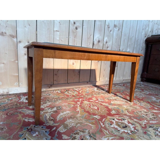Art Deco piano bench, dating from the 1930s, with a stained wood frame featuring the characteristic curves of the French...