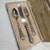Set of 19th-century Gothic-style Silver Cutlery with Case. 231 grams. Height: 11.03 in (28 cm) Width: 5.12 in (13 cm)...