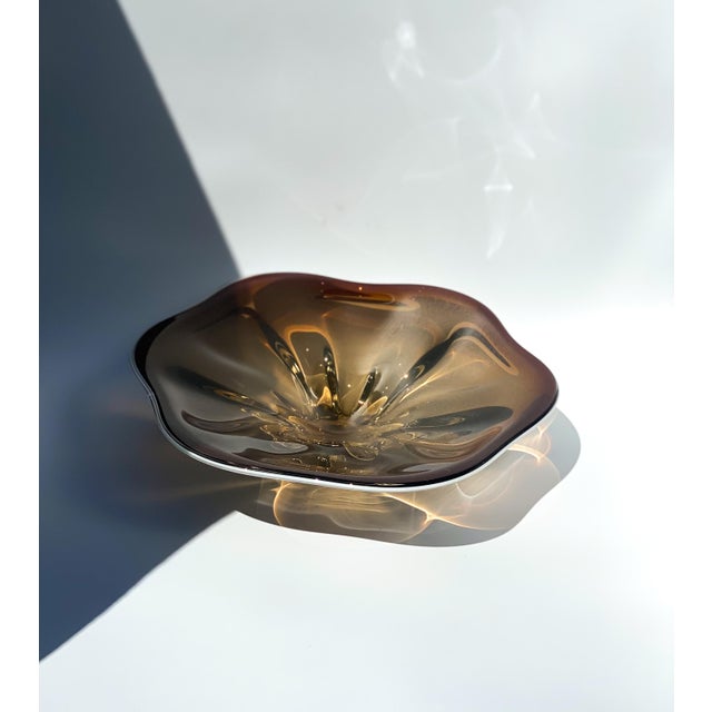 Murano style art glass footed centerpiece bowl in a mid-century brown color. Organic curved flower shape with beautiful...