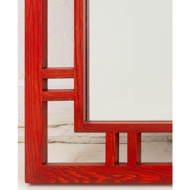 James Mont Style Red Stained Oak Framed Mirror, the reticulated frame with geometric design. Mirror plate: 36.75" H x...