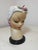 Lady Head or Ucagco girl's head, made in Japan. It was used by florists to create flower bud arrangements that were then...