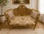 Add a touch of timeless French elegance to your interior with this exquisite Louis XV–style settee. Featuring an ornate...