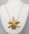 Vintage 1964 Signed Napier Goldtone & Faux-Pearl Orchid Pendant Necklace For Sale In Philadelphia - Image 6 of 11