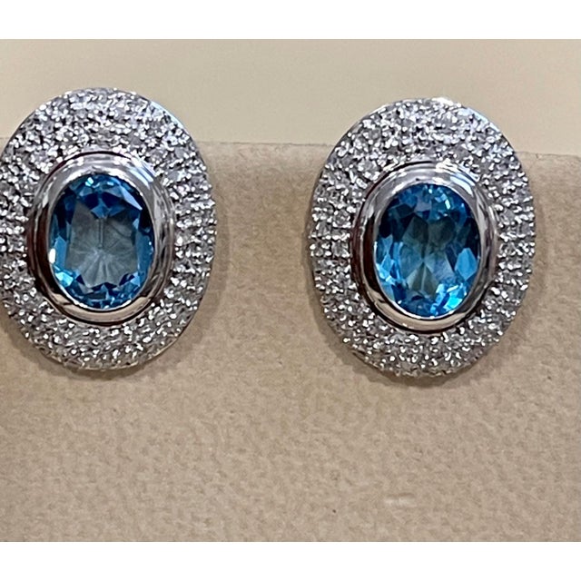 2010s 5 Carat Oval Shape Blue Topaz and Diamond Omega Back Clip Earring 14 Karat Gold For Sale - Image 5 of 18