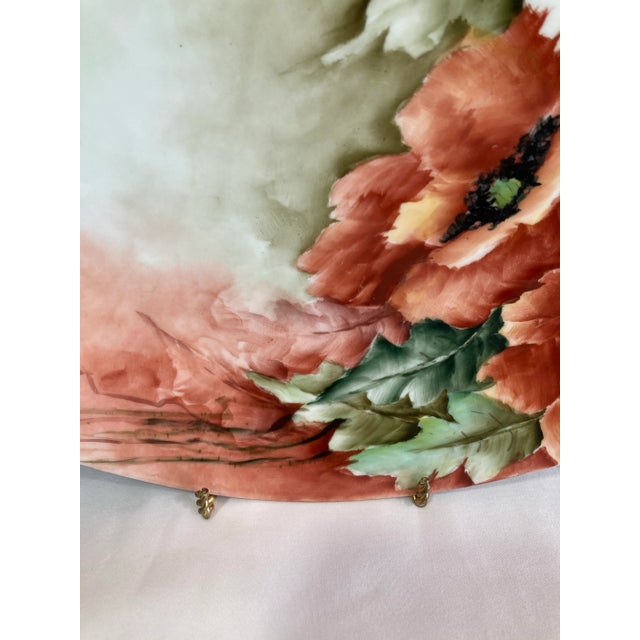 Very pretty floral decorative plate featuring Hibiscus flowers in shades of pink and white.