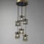An Italian six light pendant chandelier. Smoked glass, ebonized wood and brass details.