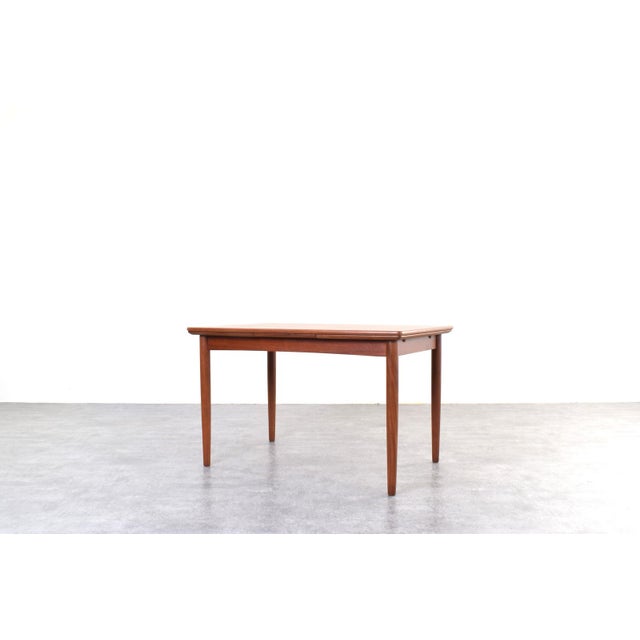 This teak table was manufactured in Denmark in the 1960s. It has been professionally and carefully restored by removing...