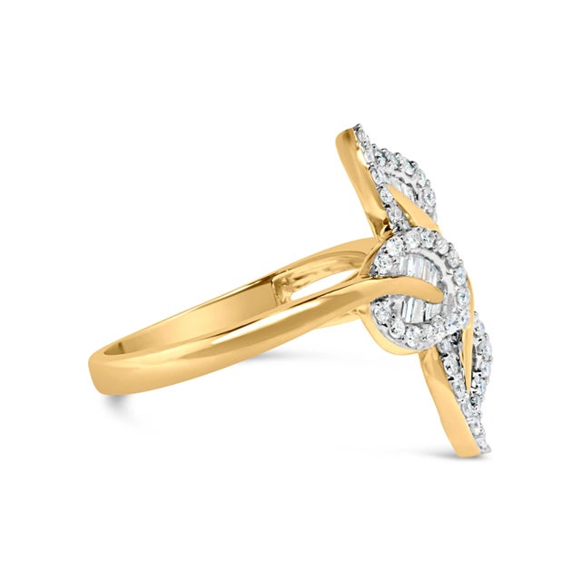 Embrace nature's splendor with our 18K Yellow Gold Plated Triple Leaf Ring, a botanical masterpiece in .925 sterling...