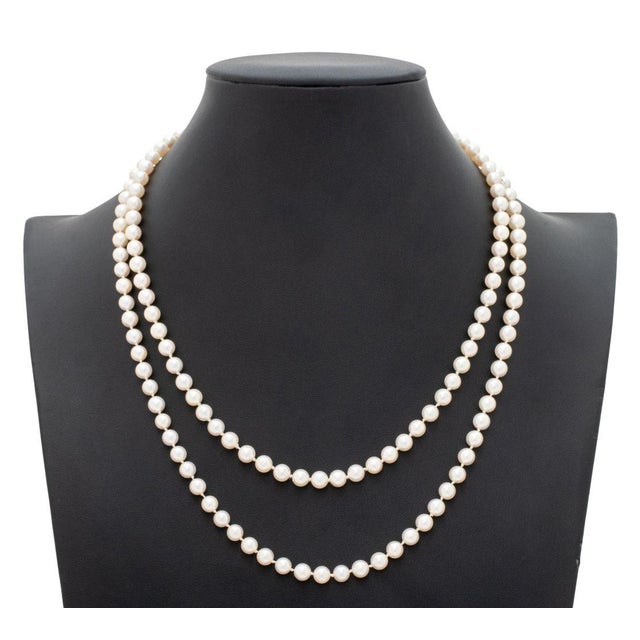 14K Yellow Gold Two-Strand Cultured Pearl Necklace, marked: "14K". Length: 20" nested; approx. 149 Cultured Pearls: 5.5 to...
