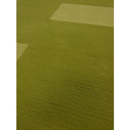 This elegant Tisca “Vermont” wool rug represents the sophisticated modern textile design tradition associated with the...