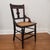 This cute little Eastlake chair is in great condition. It features spindle turned front legs, double stretchers on each...
