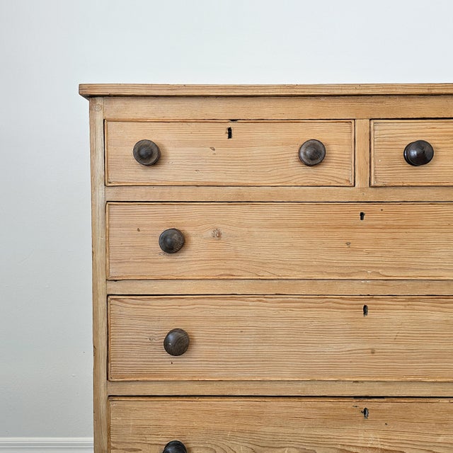 Dimensions: 19"D x 45.25"W x 41.25"H A beautifully timeworn English pine chest, rich with natural texture and quiet...