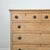 Dimensions: 19"D x 45.25"W x 41.25"H A beautifully timeworn English pine chest, rich with natural texture and quiet...
