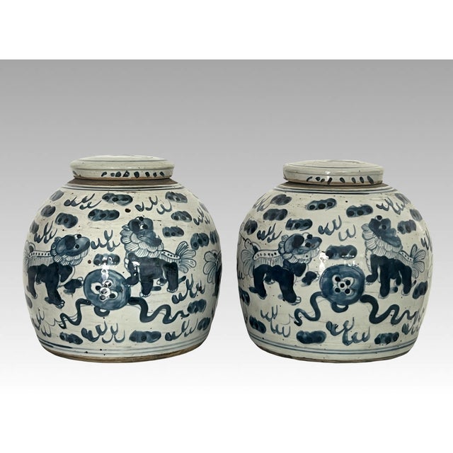 A rare pair of Qing Dynasty Chinese Blue and White Storage / Ginger Jars from the Mid 19th. Century. Hand decorated in...