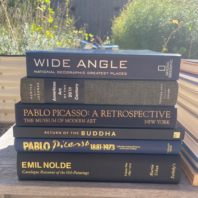 A curated collection of 22 vintage and pre-owned fine art, photography and museum coffee table books, featuring major...