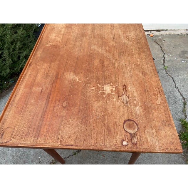 The Vintage MCM Danish Teak Floating Desk by Peter Løvig Nielsen is a stylish and functional piece of furniture that hails...