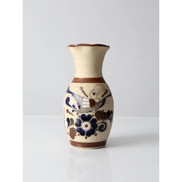 Mid-century Tonalá pottery vase, handcrafted Mexican ceramic signed by the artist. The piece features traditional hand-...