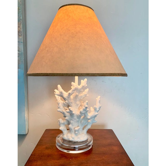 Fun white faux coral table lamp with clip on paper shade - the perfect accessory for those sun filled days! The lamp body...