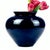 Add a rich pop of color to your home decor with this striking vintage Haeger ceramic vase. Finished in a glossy dark navy...