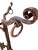 Hand-forged heavy wrought iron garden plant stand with lower and middle swirl details. Top is embellished with 3 dangling...