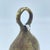 The brass metal bell was crafted by the Benue and Chamba artisans and metalworkers of Nigeria. These bells were often used...
