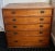 Beautiful vintage mid-century modern teak chest of drawers featuring stunning natural grain patterns and warm honey tones....