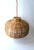 A round wicker chandelier pendant light with plug-in capability (to electrical outlet.) This round wicker chandelier...