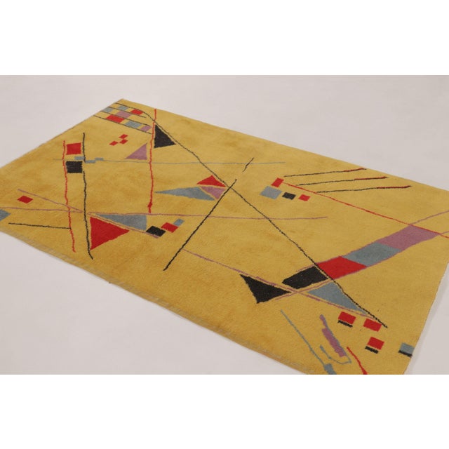 Hand-knotted in plush wool circa 1960-1970, this extraordinary pair of 4x6 vintage rugs from Turkey represents a highly...