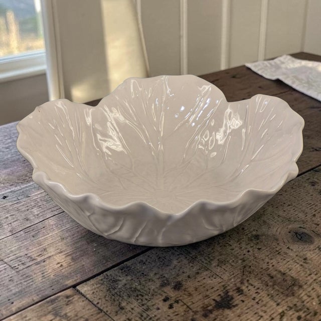 The Vintage Bordallo Pinheiro Portugal Cabage Leaf White Serving Bowl is a stylish and elegant piece of ceramic serve...