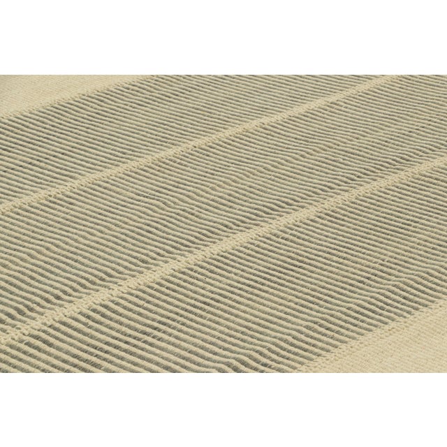 Handwoven in wool, a 8x11 Kilim design from an inventive new contemporary flat weave collection by Rug & Kilim. On the...