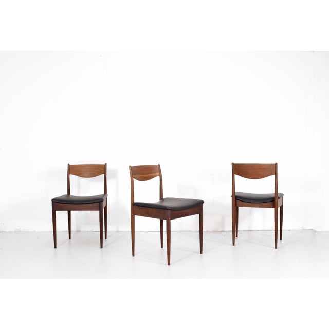 Mid-Century Modern Teak and Leatherette Dining Chairs, 1960s, Set of 4, in Very Good conditions. Designed 1960 to 1969