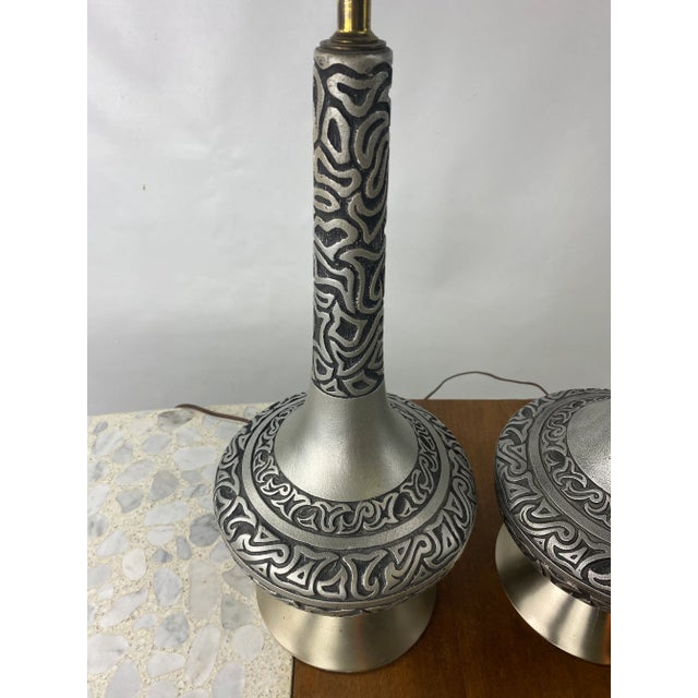 Great set of mid century silver ceramic and stainless lamps.