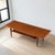 Stunning early Danish Modern teak coffee table by Peter Hvidt and Orla Mølgaard Nielsen for France and Son. The masterful...