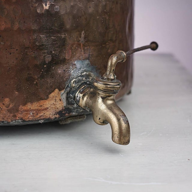 Ancient copper drinks holder Height: 40 width: 40. This piece is attributed to the mentioned designer/maker. It has no...