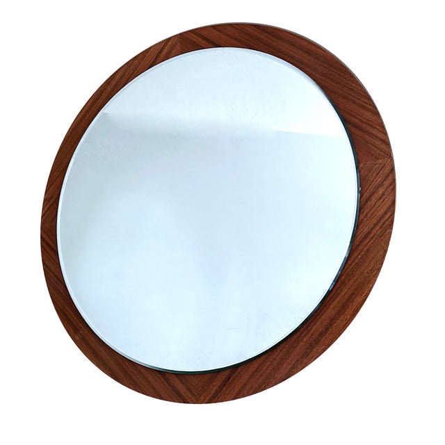 l large vintage circular wall mirror, danish Modern, produced circa 1960s-1970 with a wood veneer frame DIMENSIONS 22 in.H...