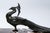 Art Deco figurative table lamp from France in very good condition for its age. The combination of marble, the peacock...