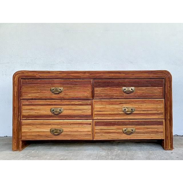 This stunning vintage dresser captures the organic elegance of the 1970s boho-chic aesthetic. Featuring a masterful...