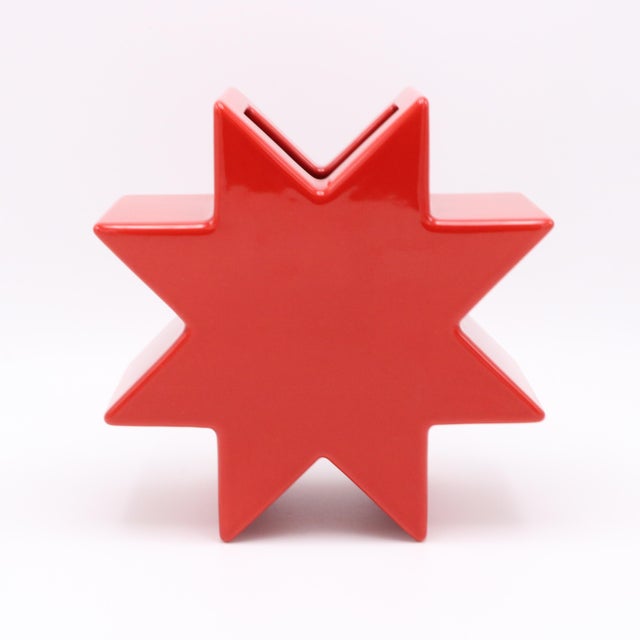 "Hsing" vase designed by Ettore Sottsass for Alessio Sarri, Sesto Fiorentino. Red glazed ceramic. Marked: E. Sottsass, A....