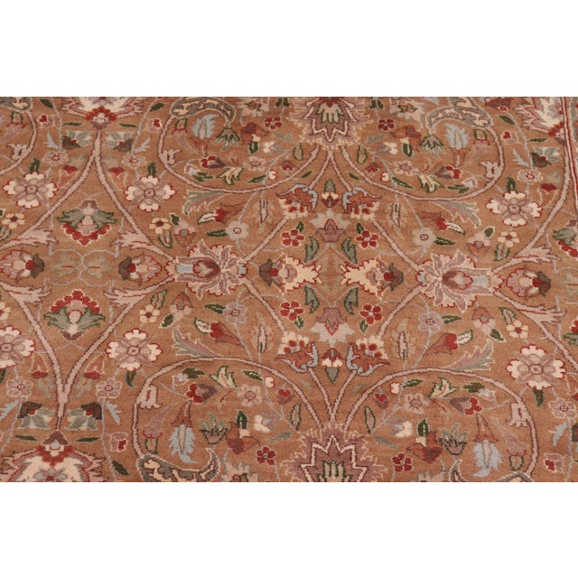 Designed with mesmerizing intricacy and gorgeous color palette, this hand-knotted masterpiece demonstrates the beauty and...