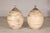 These two large-scale artisan ceramic vases feature a sculptural ovoid form with a narrow, gently flared neck and a softly...