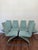 Set of six Rolf Benz Model 7800 cantilever dining chairs, showcasing refined German modern design with a sculptural,...