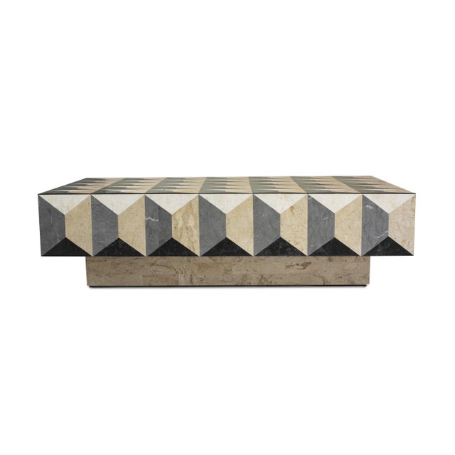 This hand-inlaid fossil stone and marble coffee table brings Fornasetti-inspired geometry to a living room, lounge or...