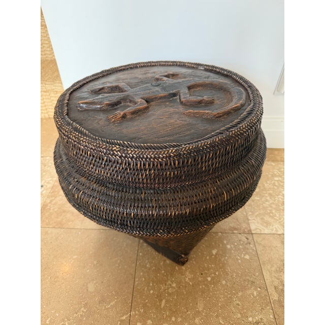 This charming handmade basket is truly unique. Fashioned from woven rattan and what appears to be bamboo, this piece has a...