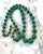 Add a touch of vintage charm with our 23" Green Nephrite Jade and Goldtone Beaded Necklace. The perfectly round nephrite...