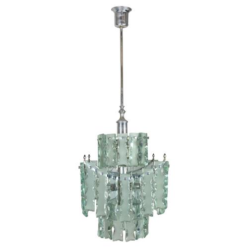 Zero Quattro (Attributed) Chandelier with metal structure and blown glass applications. Made in Italy, around 1960....