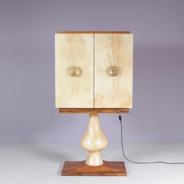 Designed by the renowned italian designer aldo tura, this exceptional bar cabinet from the 1950s is a true statement of...